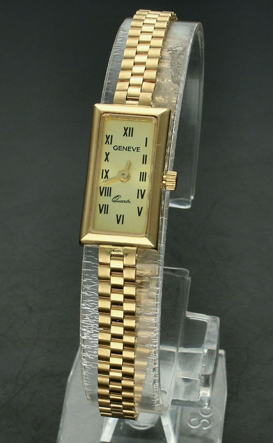 Zegarek złoty damski GENEVE próba 585, DIA-ZEG-12142-585 Złoty zegarek Geneve wykonany z wysokiej próby 585. Ten wyjątkowy zegarek posiada prostokątną czytelną tarczę wykonaną z 14-karatowego złota. genva 1.jpg