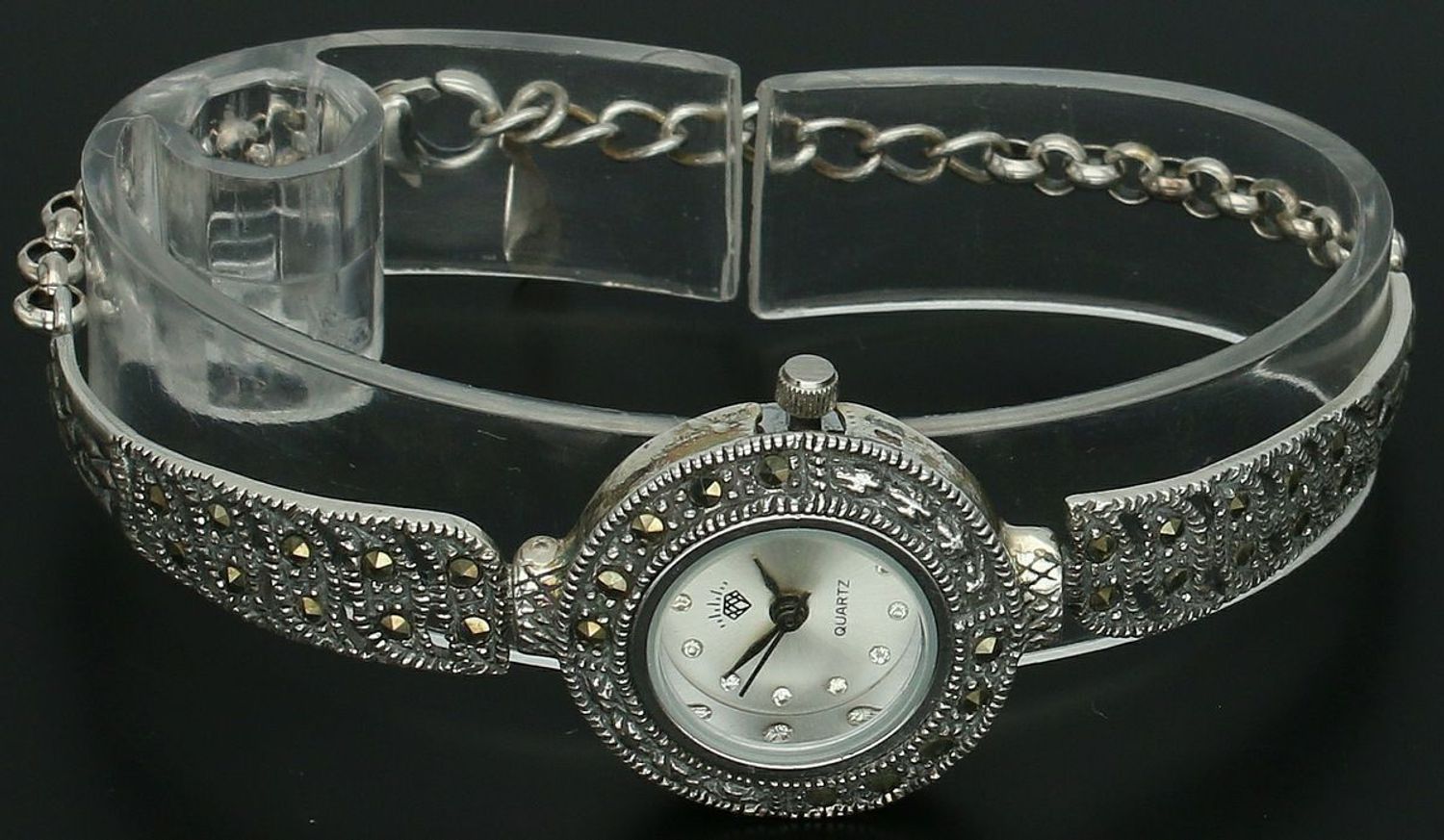 Elegancki zegarek damski ze srebra 925, waga 20,7 g. Koperta 2,2 cm, bransoletka 15+2,5 cm, zdobiony markazytami. Grawer gratis – idealny na prezent.11.jpg
