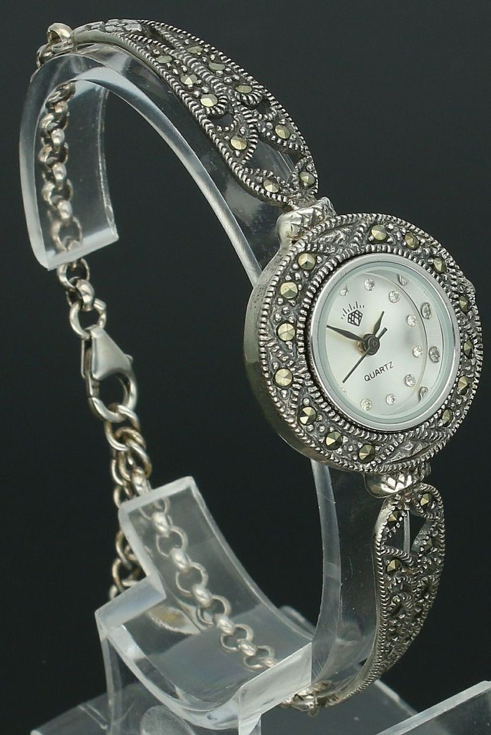 Elegancki zegarek damski ze srebra 925 o wadze 19,6 g. Zdobiony markazytami, koperta 2,4 cm, bransoletka 17+3 cm. W cenie grawer gratis – idealny na prezent.1.jpg