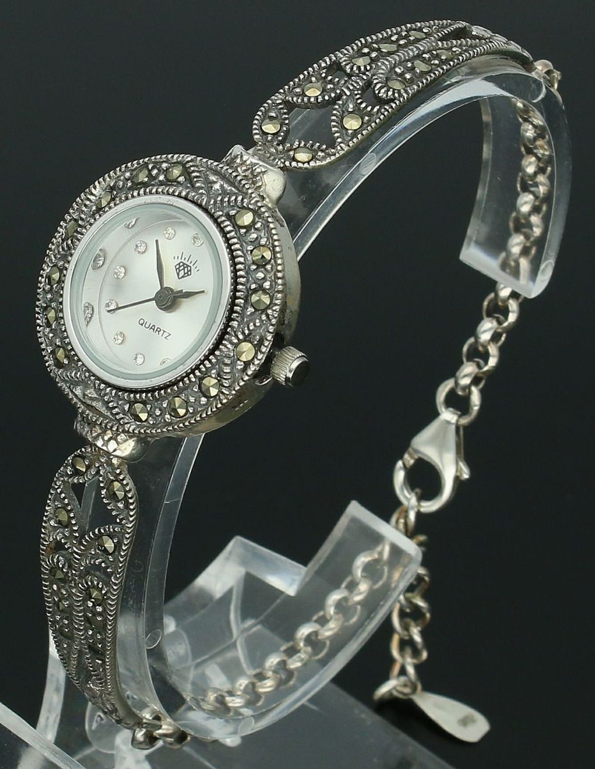 Elegancki zegarek damski ze srebra 925 o wadze 19,6 g. Zdobiony markazytami, koperta 2,4 cm, bransoletka 17+3 cm. W cenie grawer gratis – idealny na prezent.1.jpg