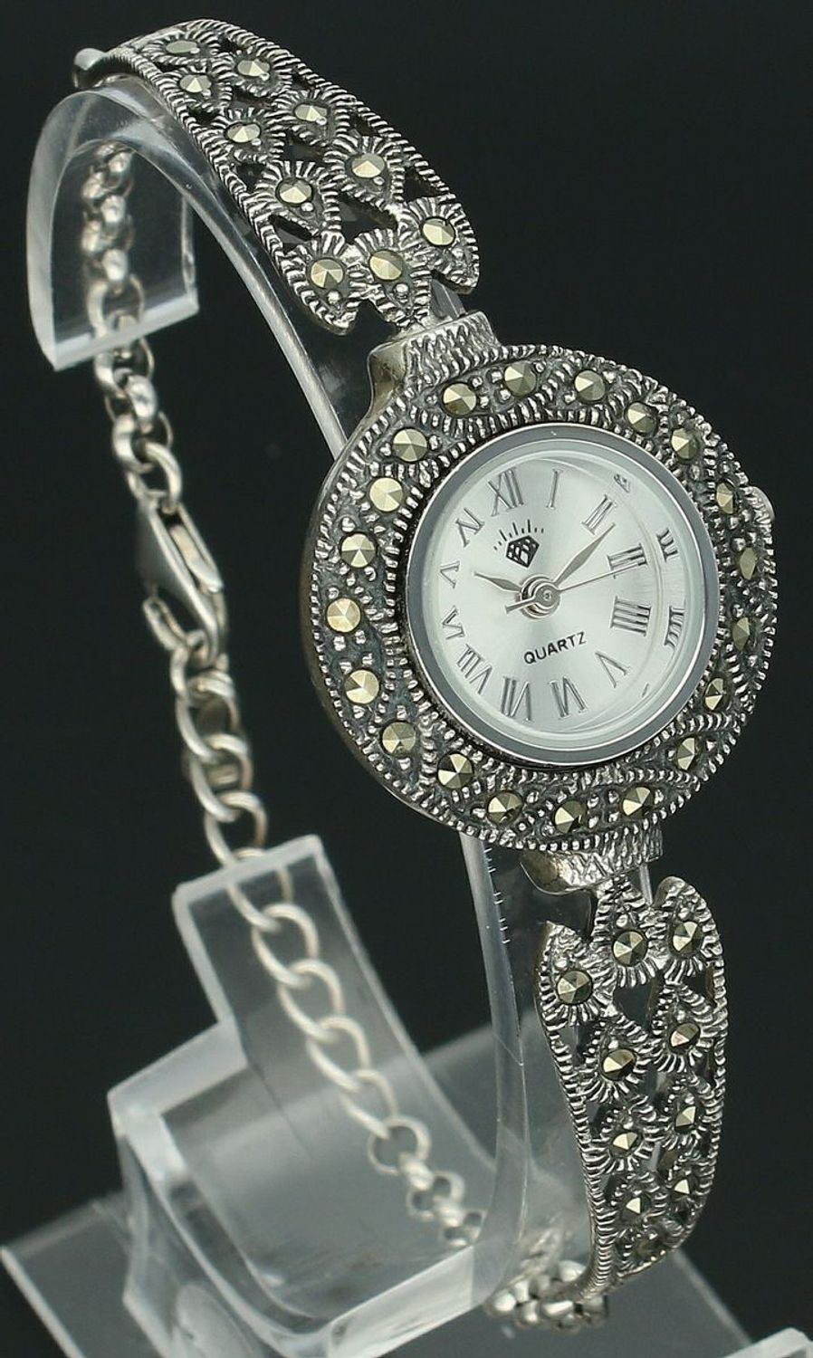 Elegancki zegarek damski ze srebra 925, waga 19 g. Koperta 2,4 cm, regulowana bransoletka 16+2 cm, zdobiony markazytami. Grawer gratis – idealny na prezent.11.jpg