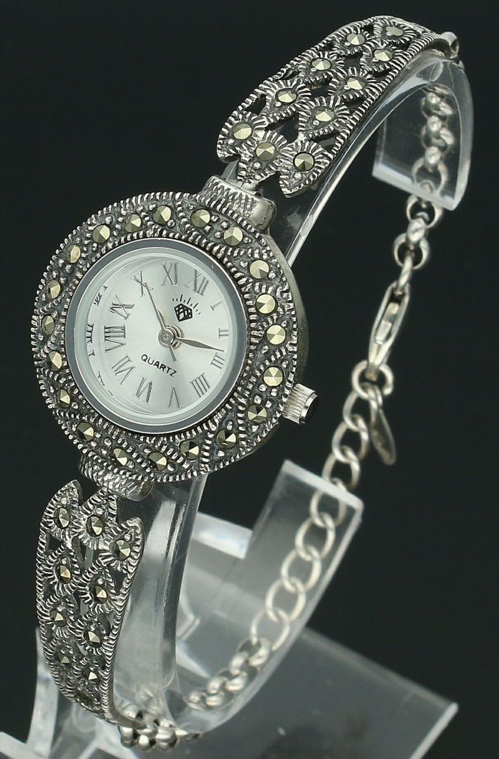 Elegancki zegarek damski ze srebra 925, waga 19 g. Koperta 2,4 cm, regulowana bransoletka 16+2 cm, zdobiony markazytami. Grawer gratis – idealny na prezent.11.jpg