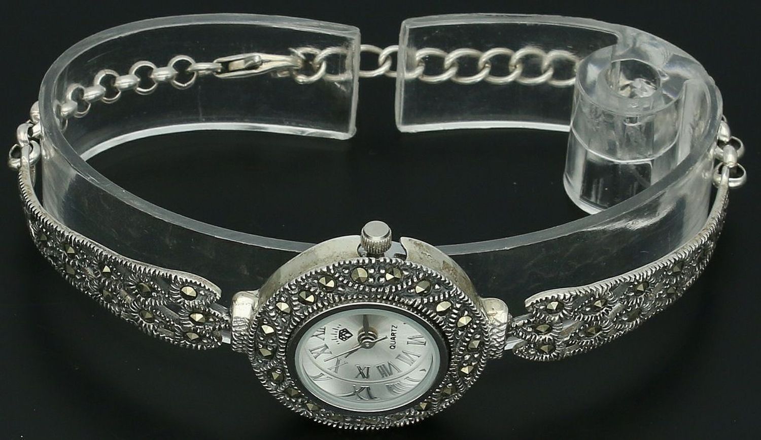 Elegancki zegarek damski ze srebra 925, waga 19 g. Koperta 2,4 cm, regulowana bransoletka 16+2 cm, zdobiony markazytami. Grawer gratis – idealny na prezent.11.jpg