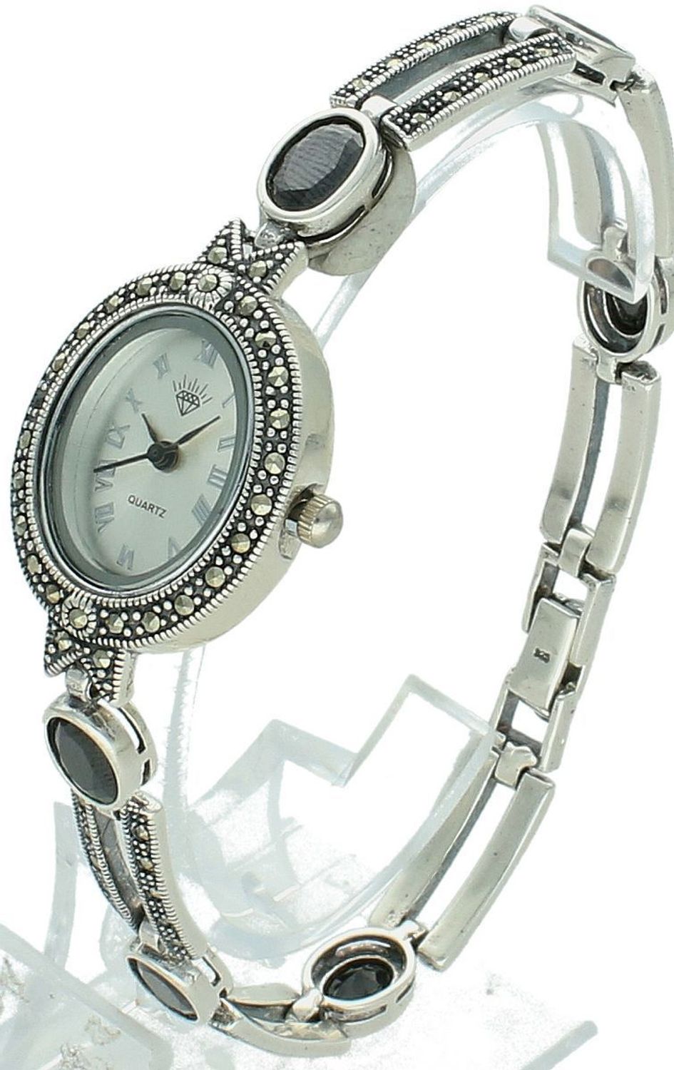 Elegancki zegarek damski ze srebra 925, waga 33,9 g. Owalna koperta 2,7 x 2,3 cm, bransoletka 21 cm x 7 mm, zdobiony markazytami i czarną cyrkonią. Grawer gratis – idealny na prezent.1.jpg