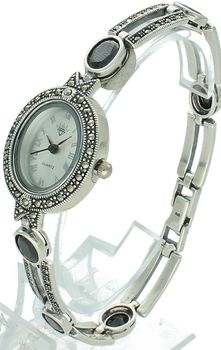 Elegancki zegarek damski ze srebra 925, waga 33,9 g. Owalna koperta 2,7 x 2,3 cm, bransoletka 21 cm x 7 mm, zdobiony markazytami i czarną cyrkonią. Grawer gratis – idealny na prezent.2.jpg