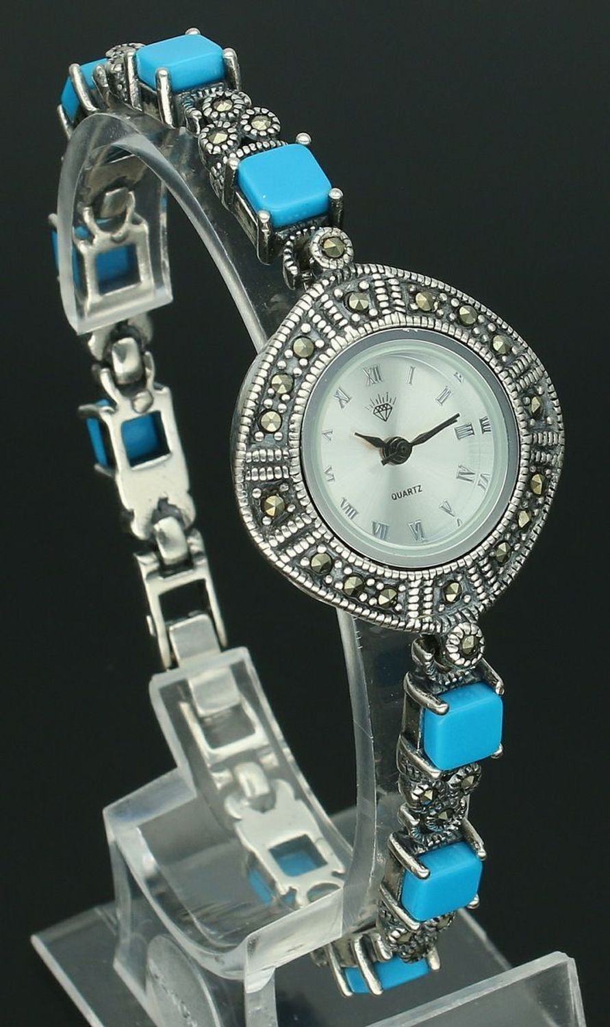 Elegancki zegarek damski ze srebra 925, waga 33,6 g. Koperta 2,7 cm, bransoletka 18 cm x 6 mm, zdobiony markazytami i turkusami. Grawer gratis – idealny na prezent.11.jpg
