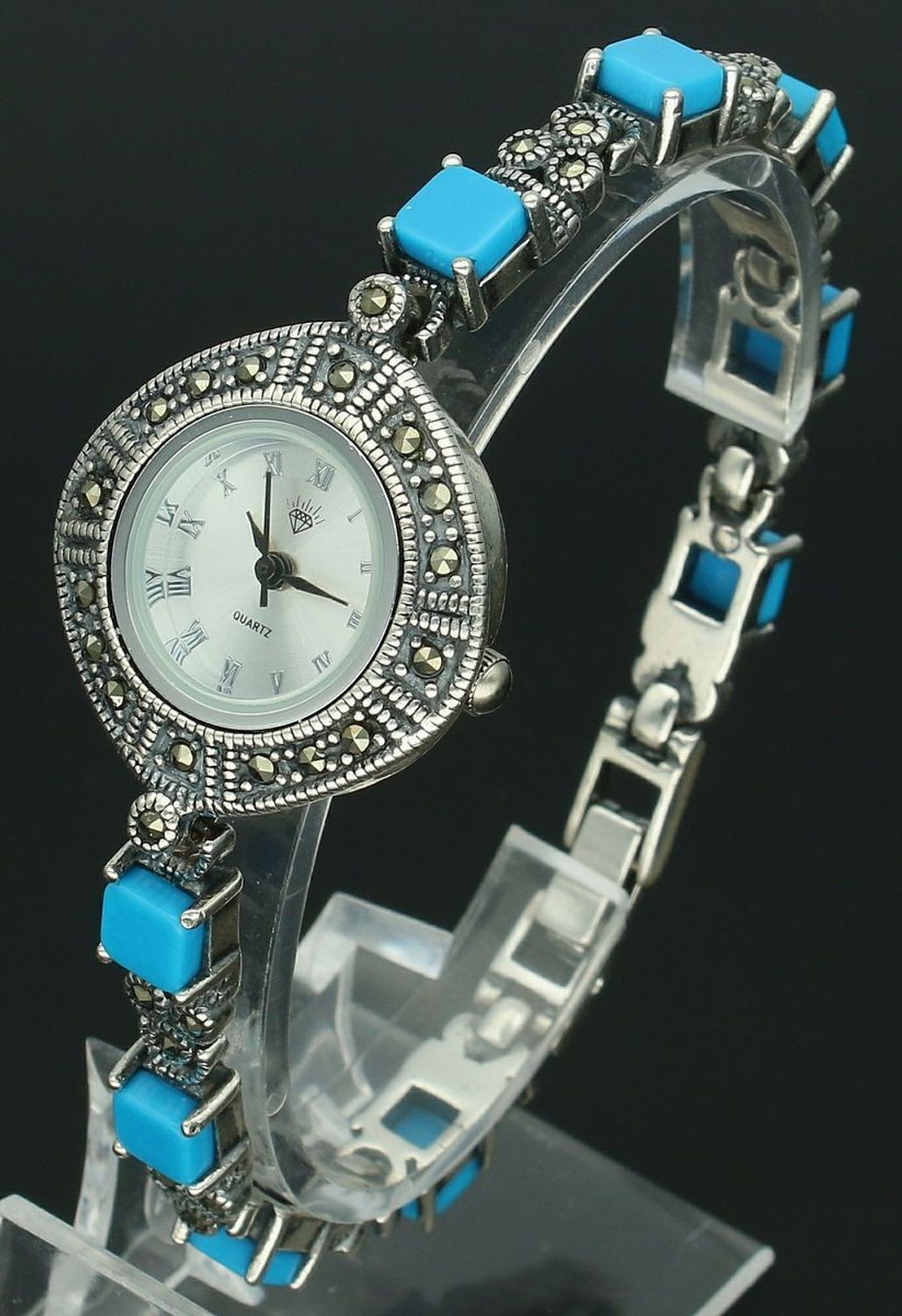 Elegancki zegarek damski ze srebra 925, waga 33,6 g. Koperta 2,7 cm, bransoletka 18 cm x 6 mm, zdobiony markazytami i turkusami. Grawer gratis – idealny na prezent.11.jpg
