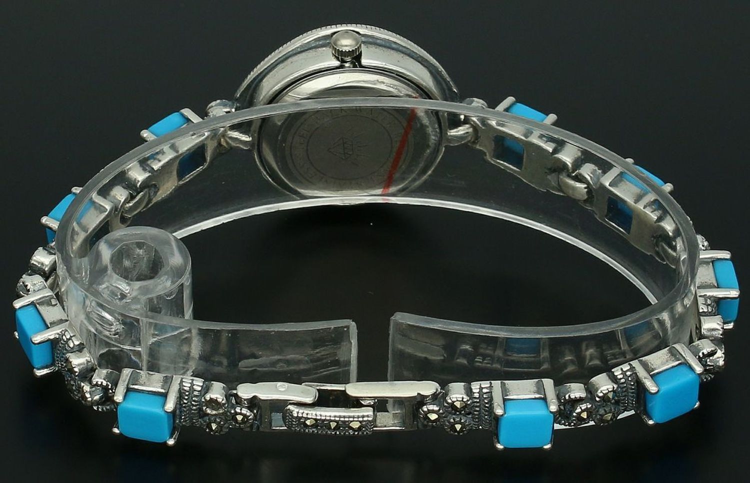 Elegancki zegarek damski ze srebra 925, waga 33,6 g. Koperta 2,7 cm, bransoletka 18 cm x 6 mm, zdobiony markazytami i turkusami. Grawer gratis – idealny na prezent.11.jpg