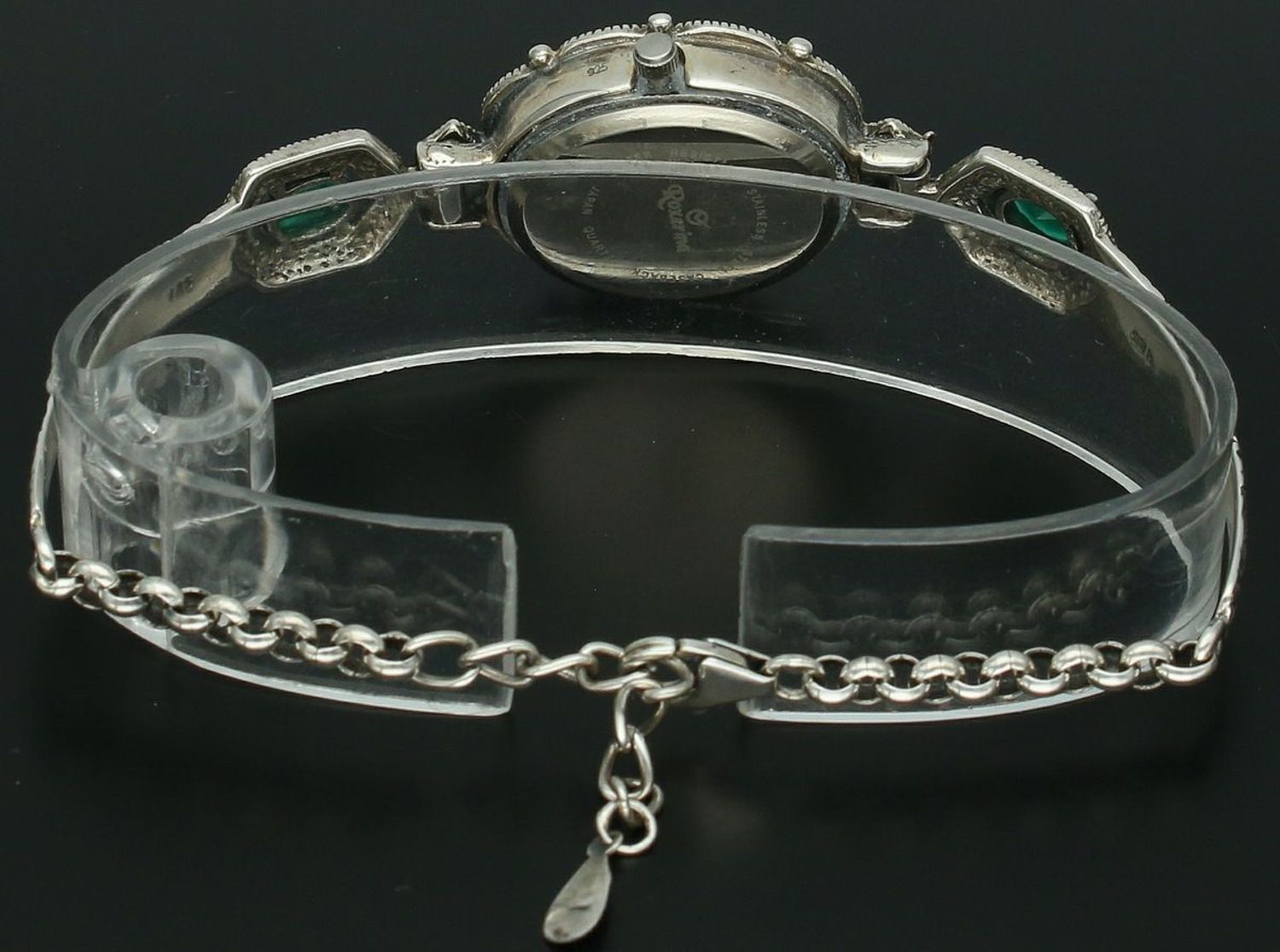 Elegancki zegarek damski ze srebra 925, waga 24 g. Owalna koperta 2,2 x 2,5 cm, bransoletka 17+3 cm, zdobiony markazytami i szmaragdami. Grawer gratis – idealny na prezent.1.jpg