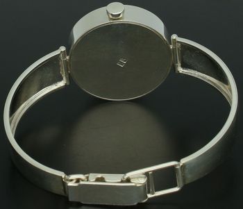 Elegancki damski zegarek srebrny próby 925 Jordan Kerr z białą tarczą, cyrkoniami i sztywną bransoletką. Stylowy dodatek na co dzień i na specjalne okazje.66.jpg