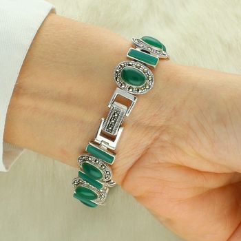 Srebrny zegarek 925 z markazytami i malachitem – elegancki model biżuteryjny (1).jpg