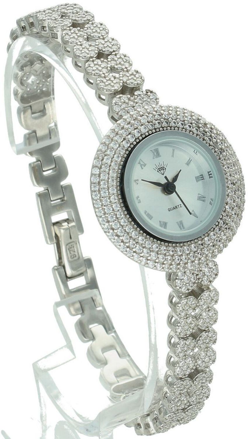 Zegarek damski srebrny DIA-ZEG-13855-925 z całym zdobieniem białymi cyrkoniami. Okrągła koperta 2,6 cm, grubość 6 mm, zapięcie na zatrzask. Elegancki i efektowny dodatek.1.jpg