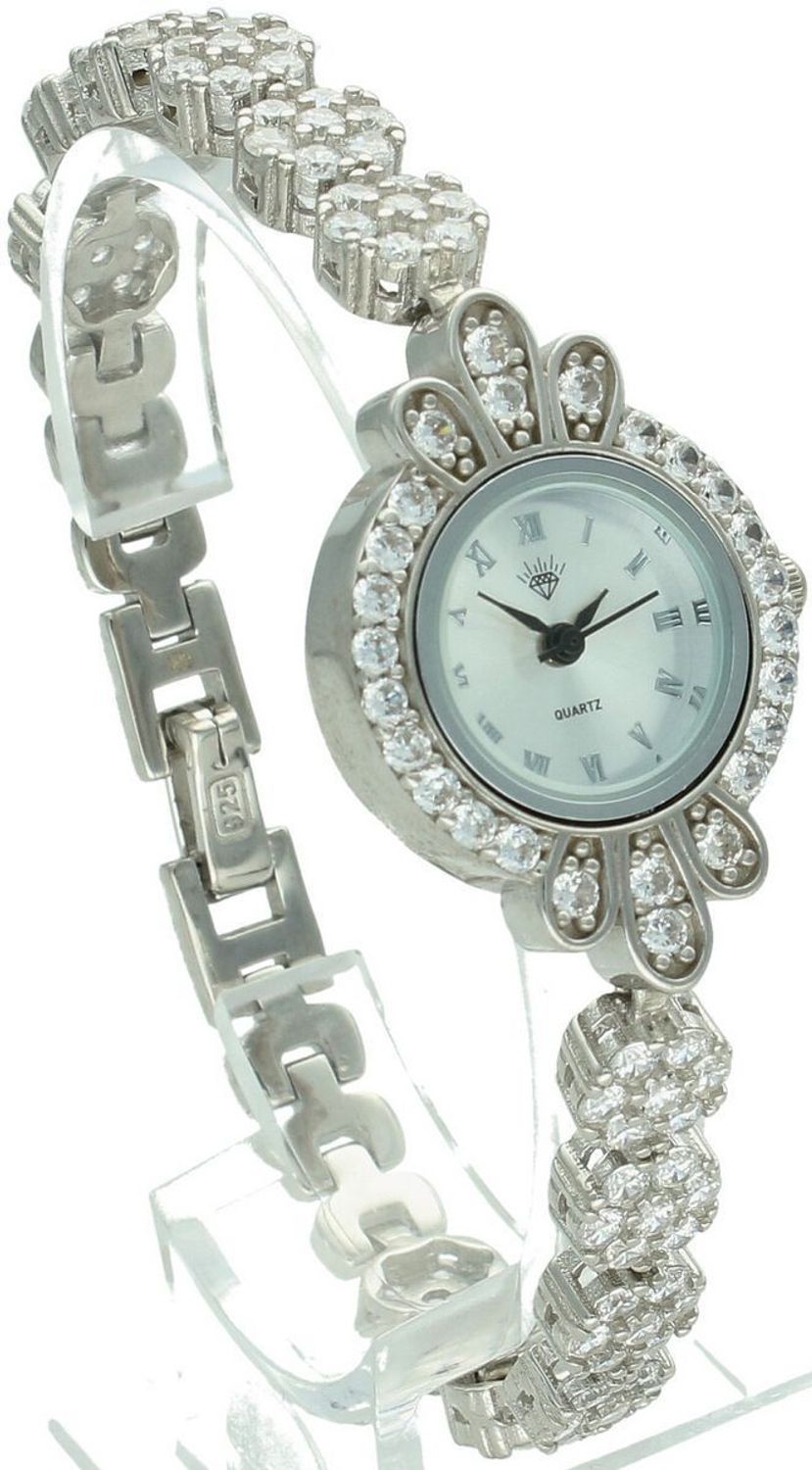 Zegarek damski srebrny DIA-ZEG-13857-925 z białymi cyrkoniami, tarcza 2,2 x 3,2 cm, długość zegarka 19 cm, zapięcie na zatrzask. Elegancki i efektowny dodatek.1.jpg