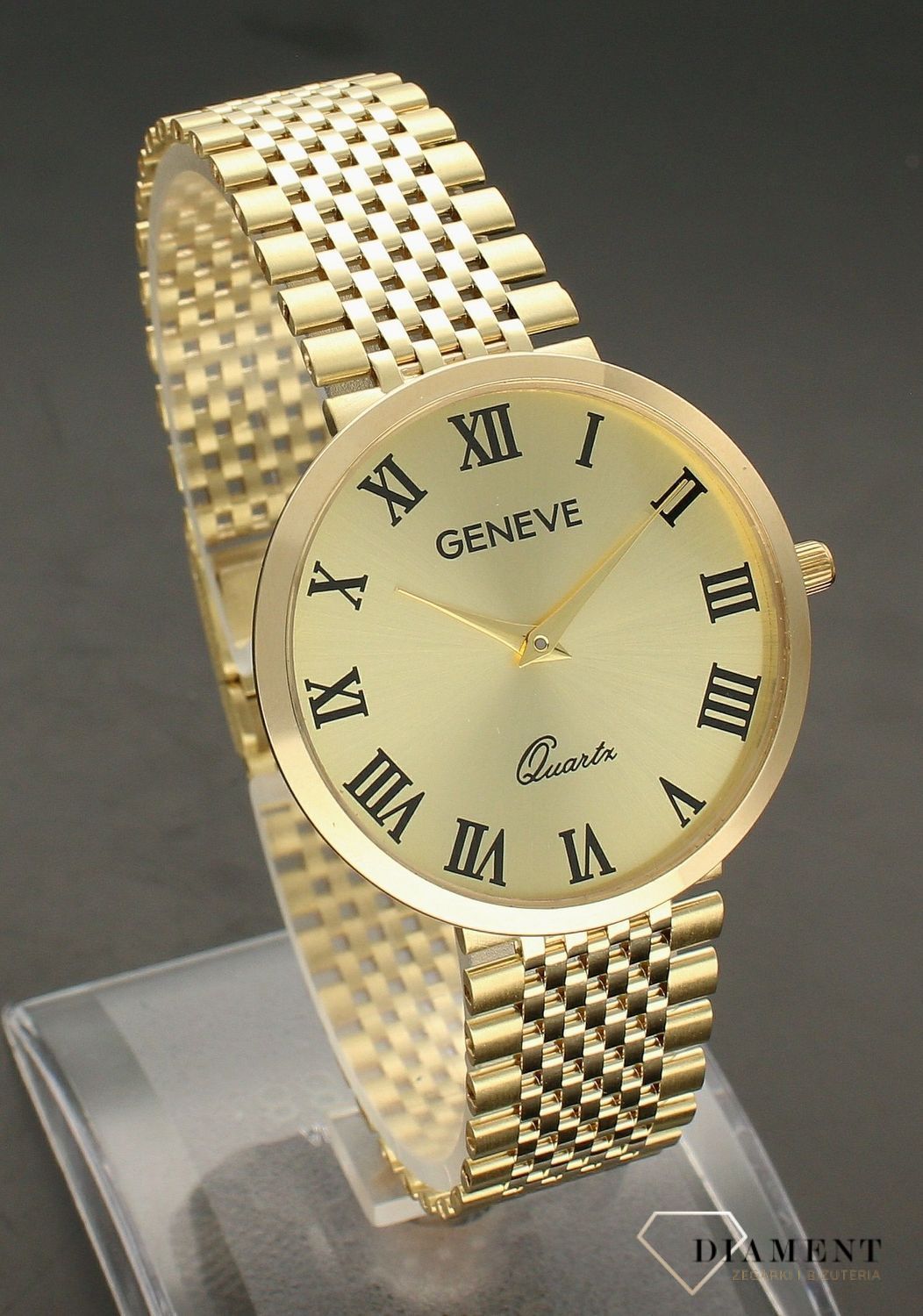 Złoty zegarek 585 damski duży na bransolecie Geneve DIA-ZEG-7825-585. Czytelna tarcza w nieskazitelnym złotym kolorze emanuje subtelnością. Elegancki i kobiecy złoty zegarek świetnie sprawdzi się na prezent dla ukocha (4).jpg