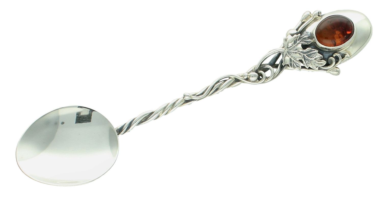 Srebrna łyżeczka do cukru z bursztynem bałtyckim i srebrnym liściem DIA-ŁYŻ-12838-925. Srebrna łyżeczka do cukru o ponadczasowym wykończeniu ozdobiona malachitem. 1.jpg