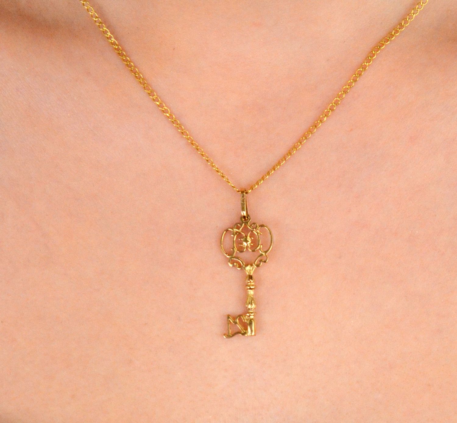 Zawieszka złota Klucz próba 333, DIA0ZAW-1525-333 przód.jpg