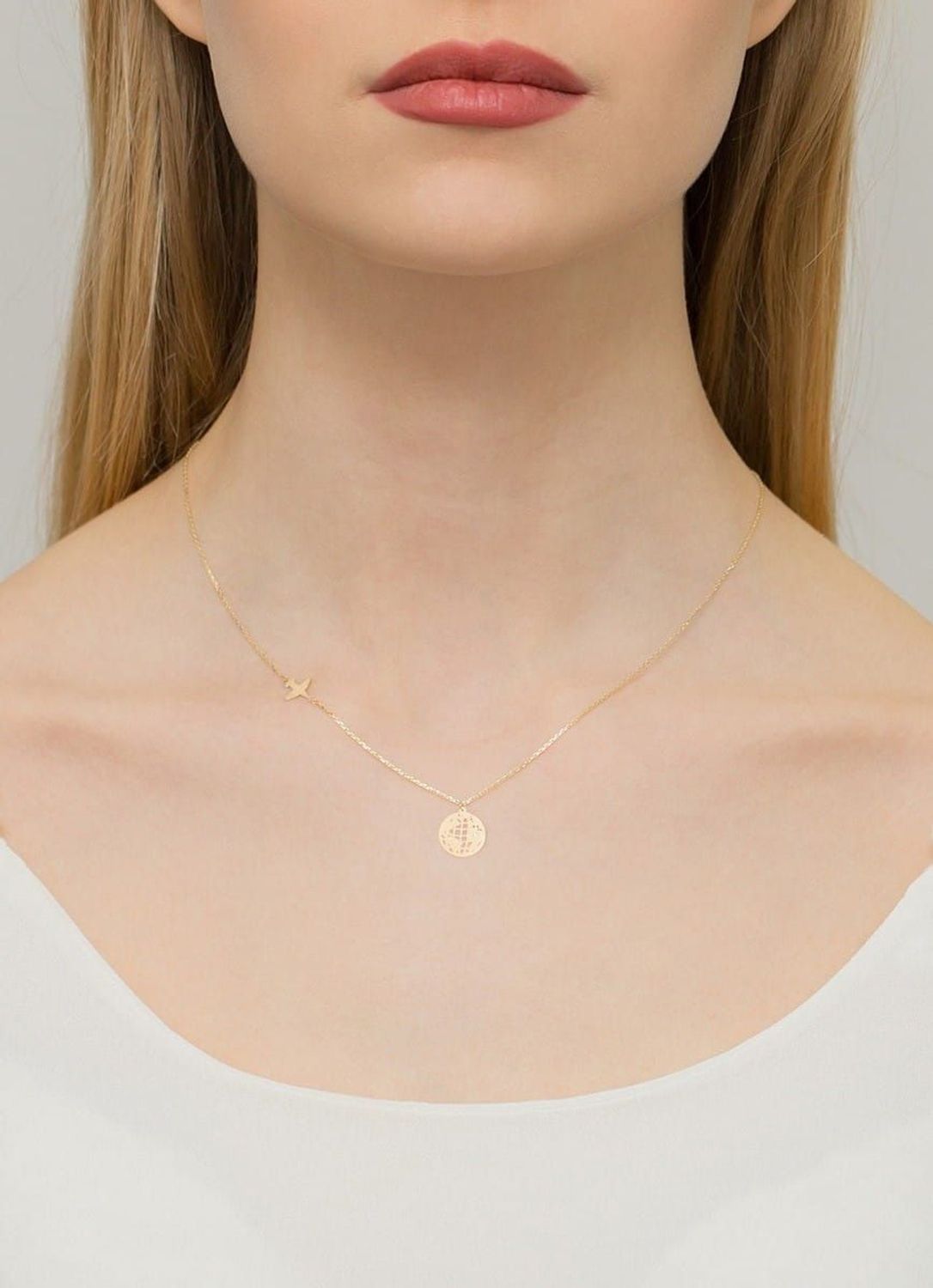 Złoty naszyjnik damski 585 Samolot i Kula Ziemska z Brylantem 0.005 2 ct.jpg