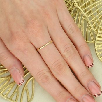 Złoty pierścionek damski 585 Topaz Sky Blue o formie serca i Diamenty 0.04 ct tył.jpg