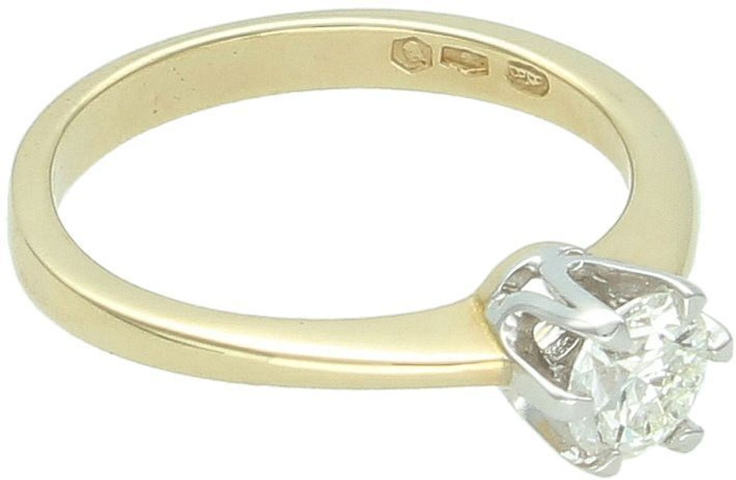 Ekskluzywny pierścionek damski ze złota próby 585, ozdobiony pojedynczym diamentem 0,70 ct o barwie F i czystości VS2. Rozmiar 18, waga 3,74 g.1.jpg