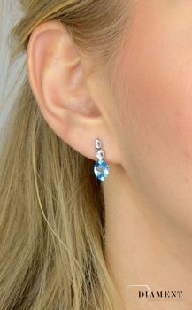 Złote kolczyki DIAMENT 585 białe złoto, topaz E2127W-10 💎 Złote kolczyki z białego złota ozdobione diamentami i topazem w kolorze niebieskim (3).JPG