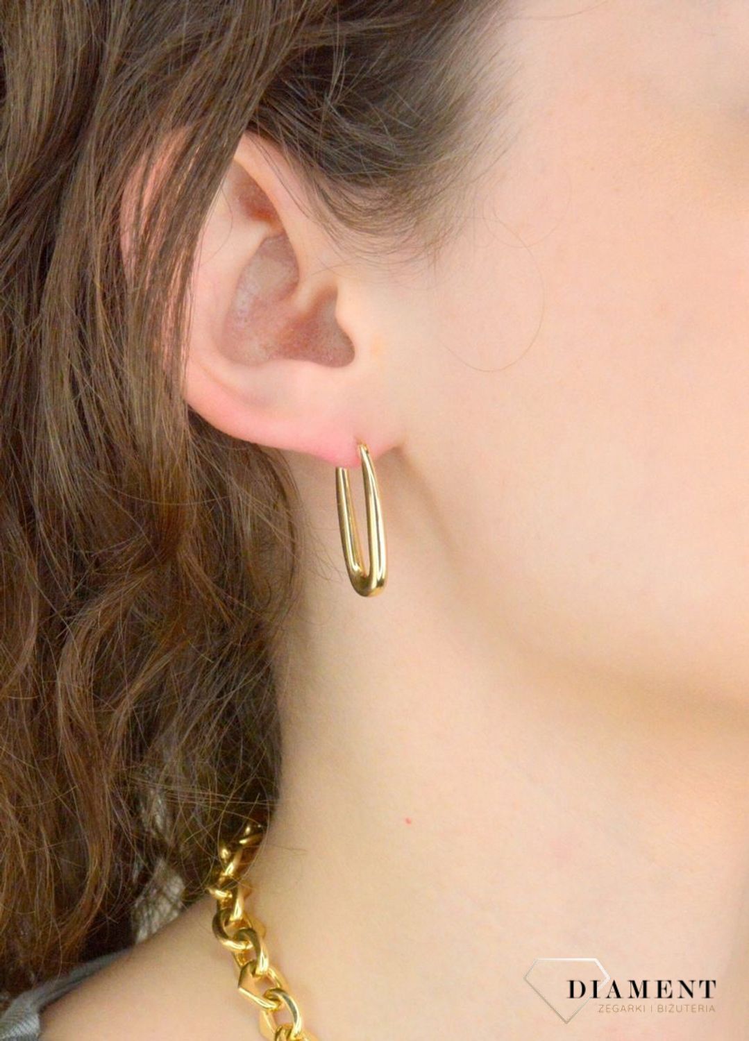 Kolczyki damskie złote pr 585, E3NUO14334 Złote kolczyki wykonane z najwyższej jakości żółtego złota, próba 585. Kolczyki w modowym stylu, wpisujące się w obecne trendy modowe. Delikatna forma1.jpg