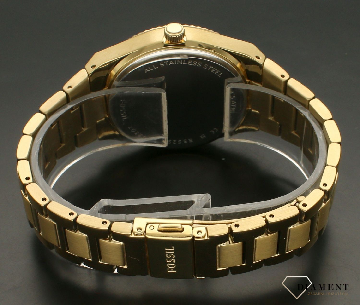 Zegarek damski Fossil SCARLETTE ES5299. Damski zegarek w złotym kolorze. Złoty zegarek damski Fossil. Zegarek damski Fossil na złotej bransolecie. Zegarek damski Fossil na bransolecie na prezent..jpg