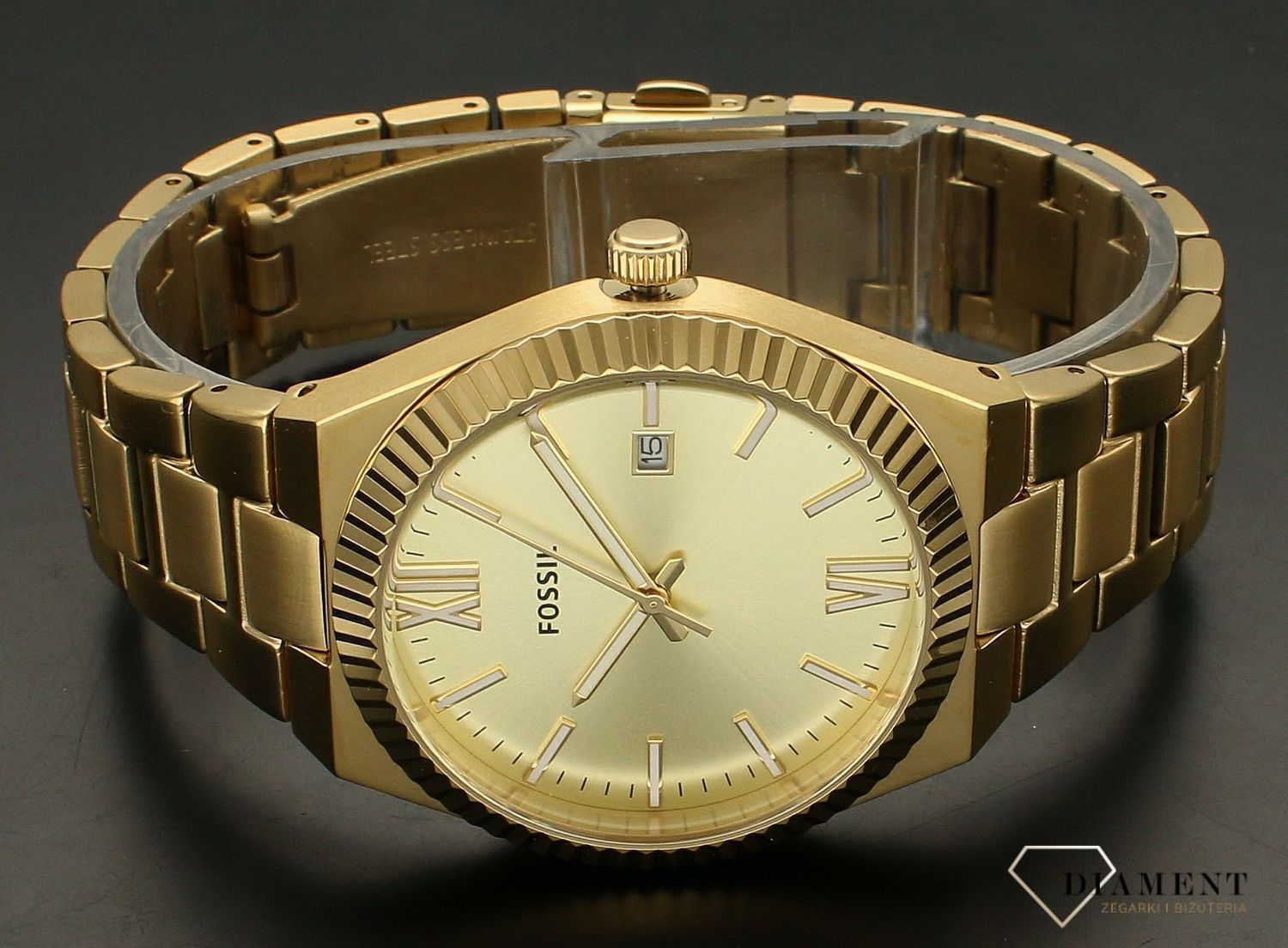 Zegarek damski Fossil SCARLETTE ES5299. Damski zegarek w złotym kolorze. Złoty zegarek damski Fossil. Zegarek damski Fossil na złotej bransolecie. Zegarek damski Fossil na bransolecie na prezent..jpg