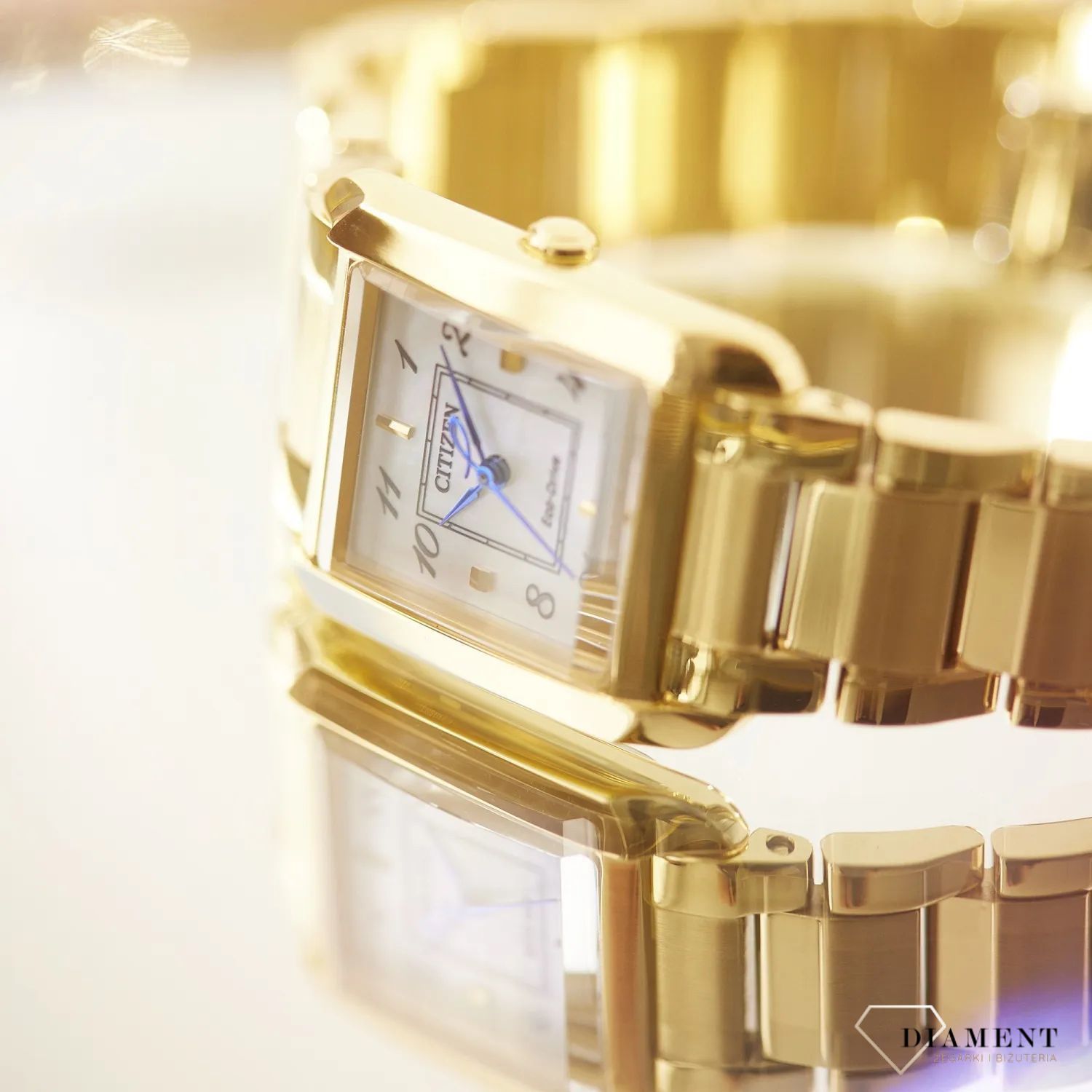 Zegarek damski Citizen Lady Eco-Drive Bianca damski EW5602-81D złoty kwadratowy. Damski zegarek solarny. Zegarek damski ze szkłem szafirowym. Zegarek dla kobiety na prezent. Złoty zegarek damski..jpg