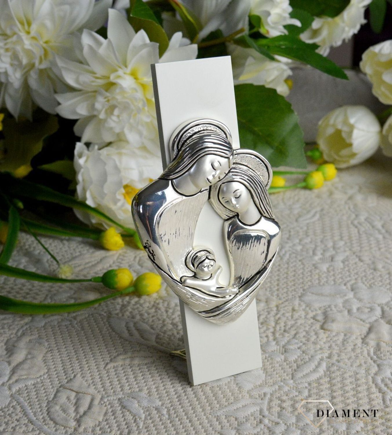 Wyjątkowy srebrny obrazek z trójwymiarową Rodziną Świętą to ozdoba i piękny symbol bożej miłości i opieki, która otacza swoje dzieci..jpg