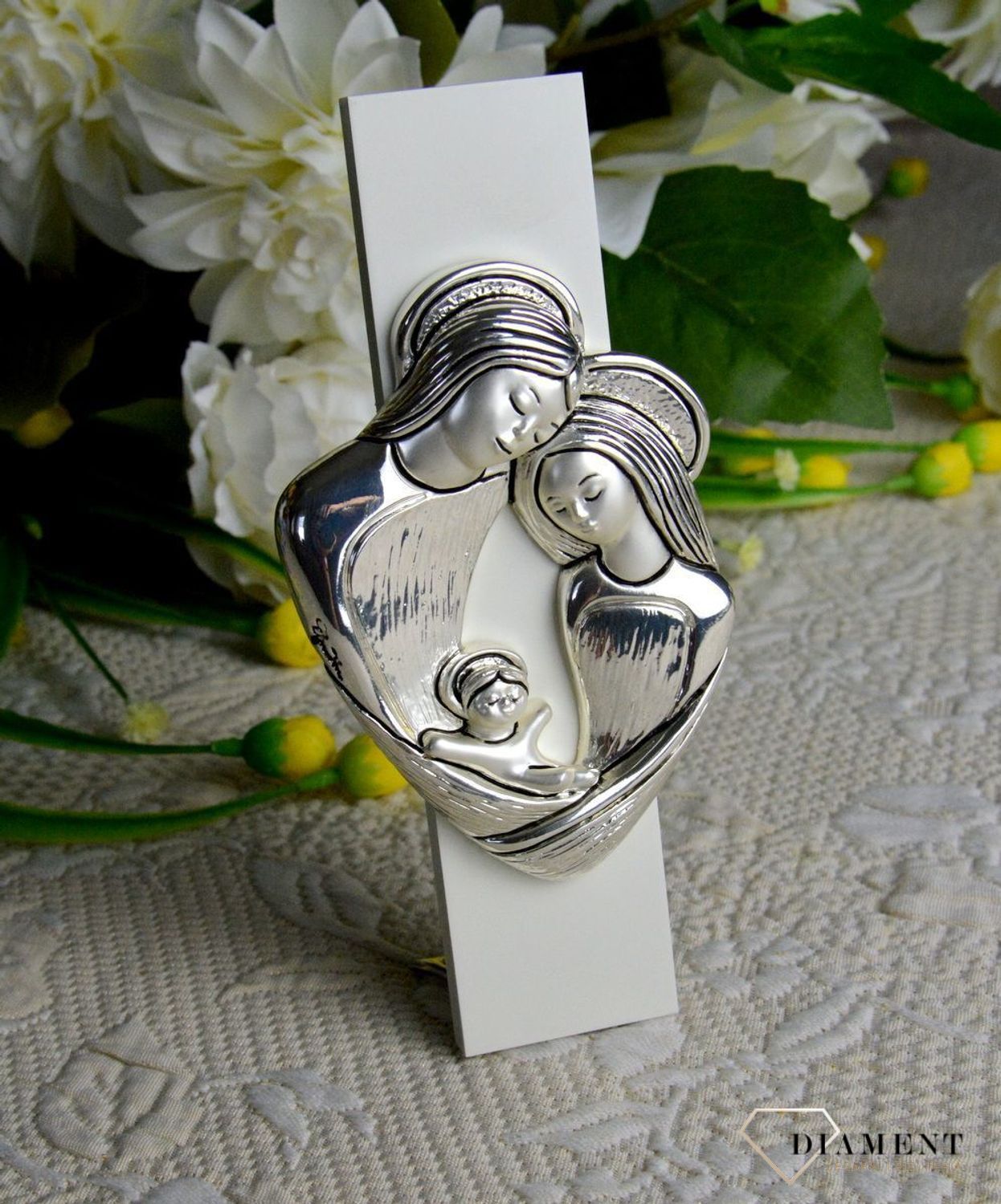 Wyjątkowy srebrny obrazek z trójwymiarową Rodziną Świętą to ozdoba i piękny symbol bożej miłości i opieki, która otacza swoje dzieci..jpg