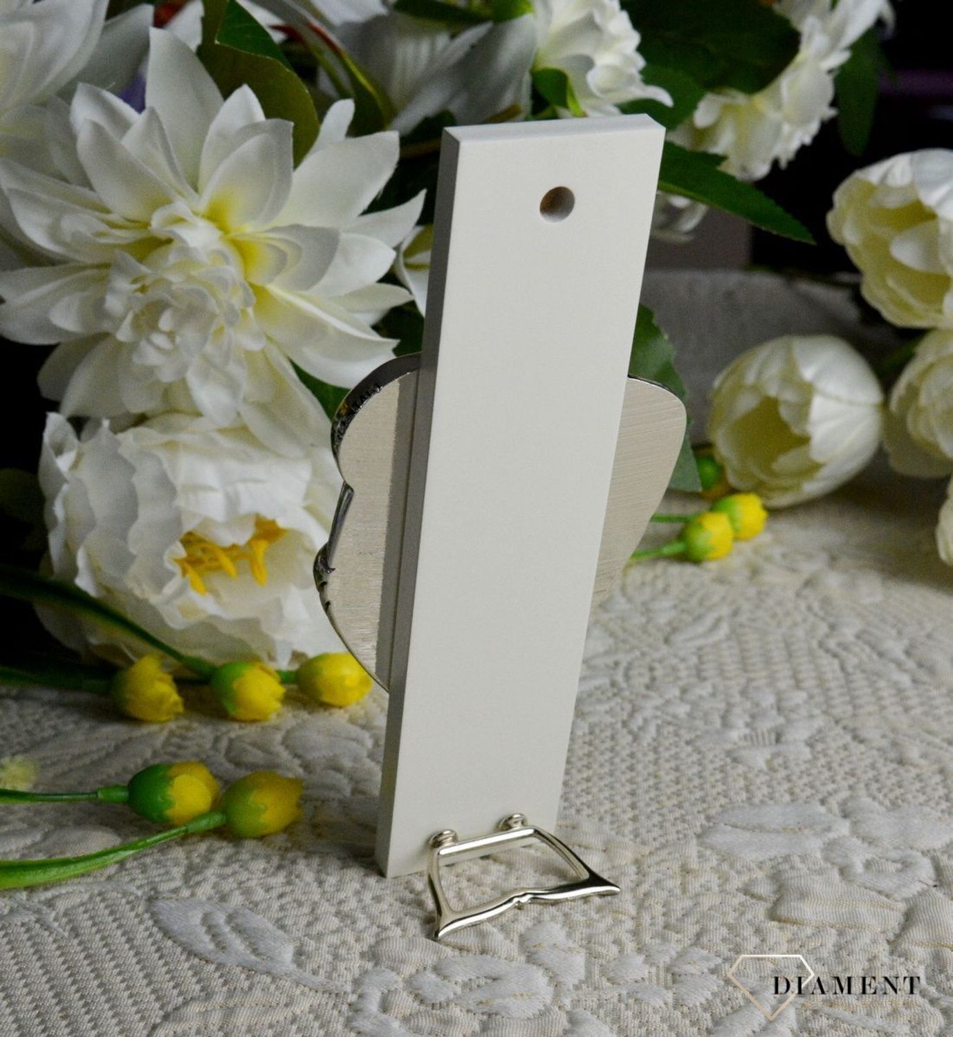 Wyjątkowy srebrny obrazek z trójwymiarową Rodziną Świętą to ozdoba i piękny symbol bożej miłości i opieki, która otacza swoje dzieci..jpg