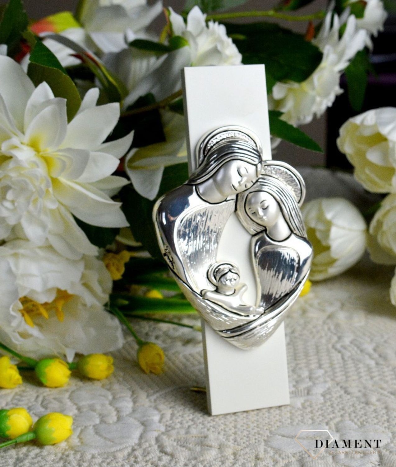 Wyjątkowy srebrny obrazek z trójwymiarową Rodziną Świętą to ozdoba i piękny symbol bożej miłości i opieki, która otacza swoje dzieci..jpg