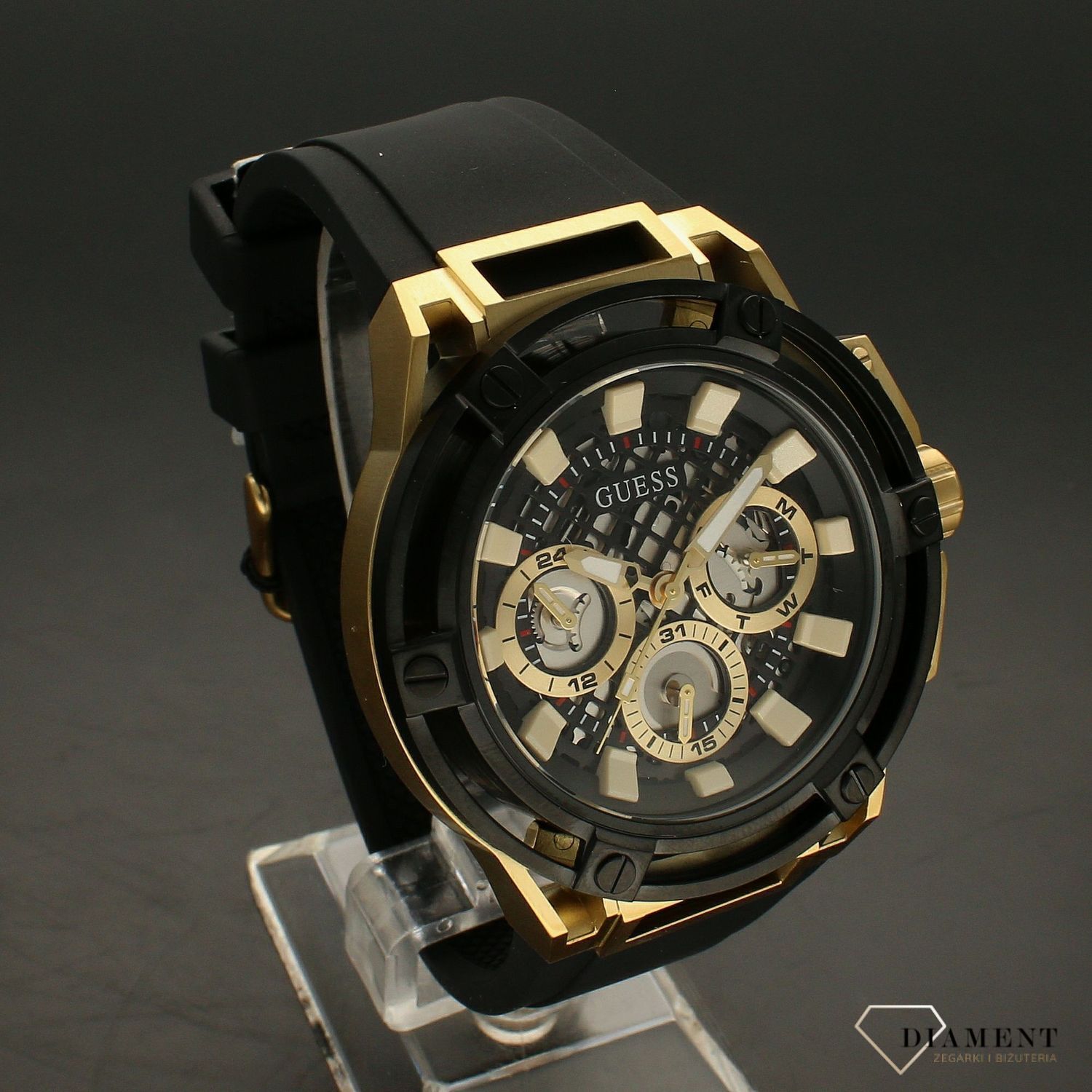 Zegarek męski GUESS Matrix GW0423G2 w czarno złotej kolorystyce to propozycja dla wszystkich tych, którzy nie chcą pozostać niezauważeni. Dokładność pracy zegarka zapewnia kwarcowy mechanizm..webp