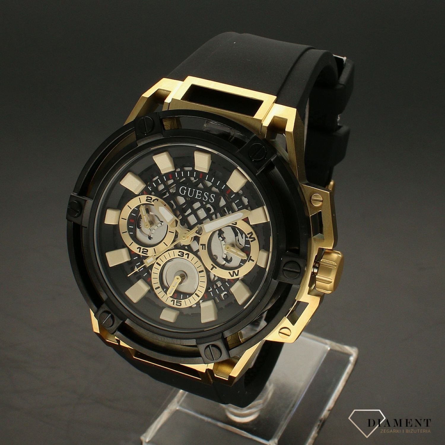 Zegarek męski GUESS Matrix GW0423G2 w czarno złotej kolorystyce to propozycja dla wszystkich tych, którzy nie chcą pozostać niezauważeni. Dokładność pracy zegarka zapewnia kwarcowy mechanizm..webp