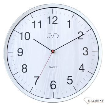 Zegar ścienny JVD HA17.1 wyposażony jest w kwarcowy mechanizm, zasilany za pomocą baterii. Posiada bardzo wysoką dokładność mierzenia czasu +- 10 sekund w przeciągu 30 dni..jpg