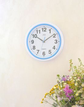Ścienny zegar JVD HA41.1.  Nowoczesny zegar w białym kolorze z niebieskimi dodatkami. Zegary do nowoczesnego wnętrza.  (7).JPG