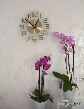 Zegar na ścianę szklany JVD ze złotymi cyframi HT098.1 to ozdobny, prosty zegar pasujący do każdego wnętrza. Ciekawa stylizacja zegara w kolorze złotym (1).JPG