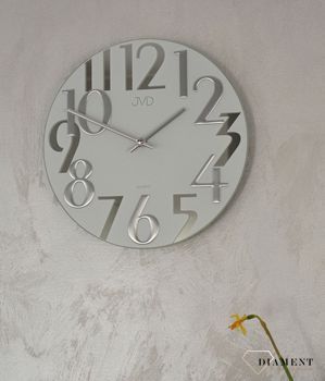 Nowoczesny zegar na ścianę do salonu 'Mleczne szkło' HT101.1.  Nowoczesny zegar na ścianę do salonu szklany JVD wyposażony jest w kwarcowy mechanizm, zasilany za pomocą baterii.Energia elektryczna potrzebna do działania (4).JPG