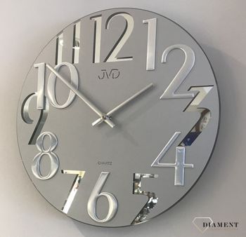 Nowoczesny zegar na ścianę do salonu szklany to bardzo modny dodatek pasujący do większości wnętrz. Okrągła tarcza zegara. Zegar ścienny do salonu (4).jpg