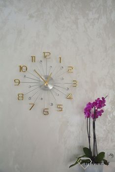 Zegar ścienny nowoczesny złoty 49 cm JVD HT109.2 to zegar na ścianę z kryszłkami i złotymi cyframi. Zegar będzie pasował do nowoczesnego wnętrza i stylowego salon (3).JPG