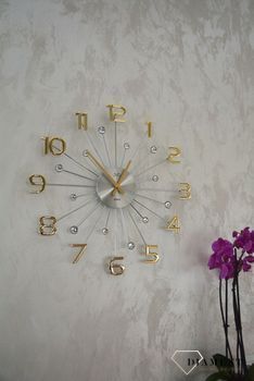 Zegar ścienny nowoczesny złoty 49 cm JVD HT109.2 to zegar na ścianę z kryszłkami i złotymi cyframi. Zegar będzie pasował do nowoczesnego wnętrza i stylowego salon.JPG