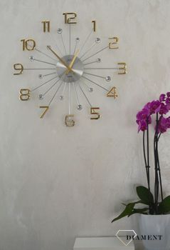 Zegar ścienny nowoczesny złoty 49 cm JVD HT109.2 to zegar na ścianę z kryszłkami i złotymi cyframi. Zegar będzie pasował do nowoczesnego wnętrza i stylowego salonu (1).JPG