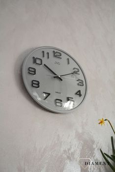Zegar na ścianę do pokoju JVD srebrny HX2472.7. Zegar ścienny w srebrnym kolorze. Zegar na ścianę do pokoju JVD HX2472.7 srebrny wyposażony jest w kwarcowy mechanizm (1).JPG