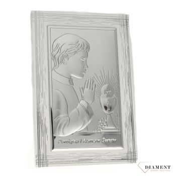Obrazek srebrny z wizerunkiem chłopca pochylającego się nad kielichem to doskonała pamiątka Pierwszej Komunii Świętej, która odda piękno tego sakramentu (1).jpg