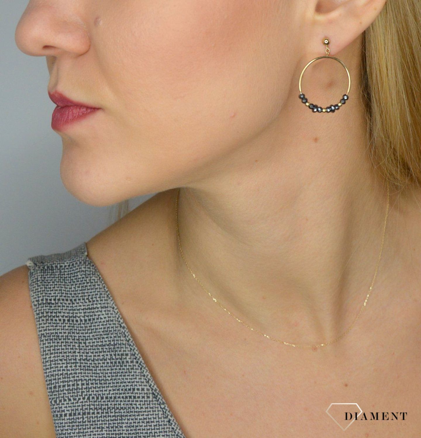 Kolczyki pozłacane koła Fossil ze stali atyalergicznej JF03271710.jpg