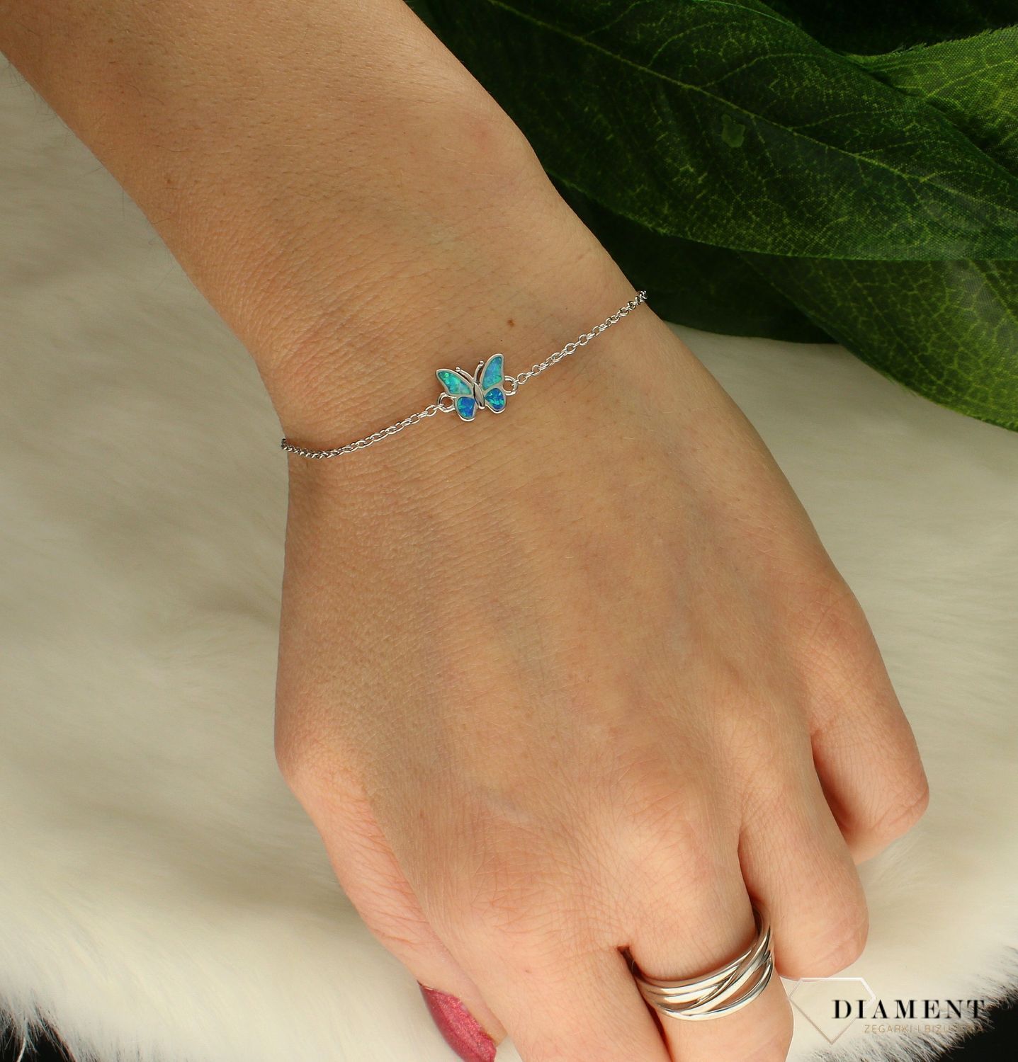 Srebrna bransoletka błyszczący motyl z niebieskim opalem JMAD0040AB14.jpg