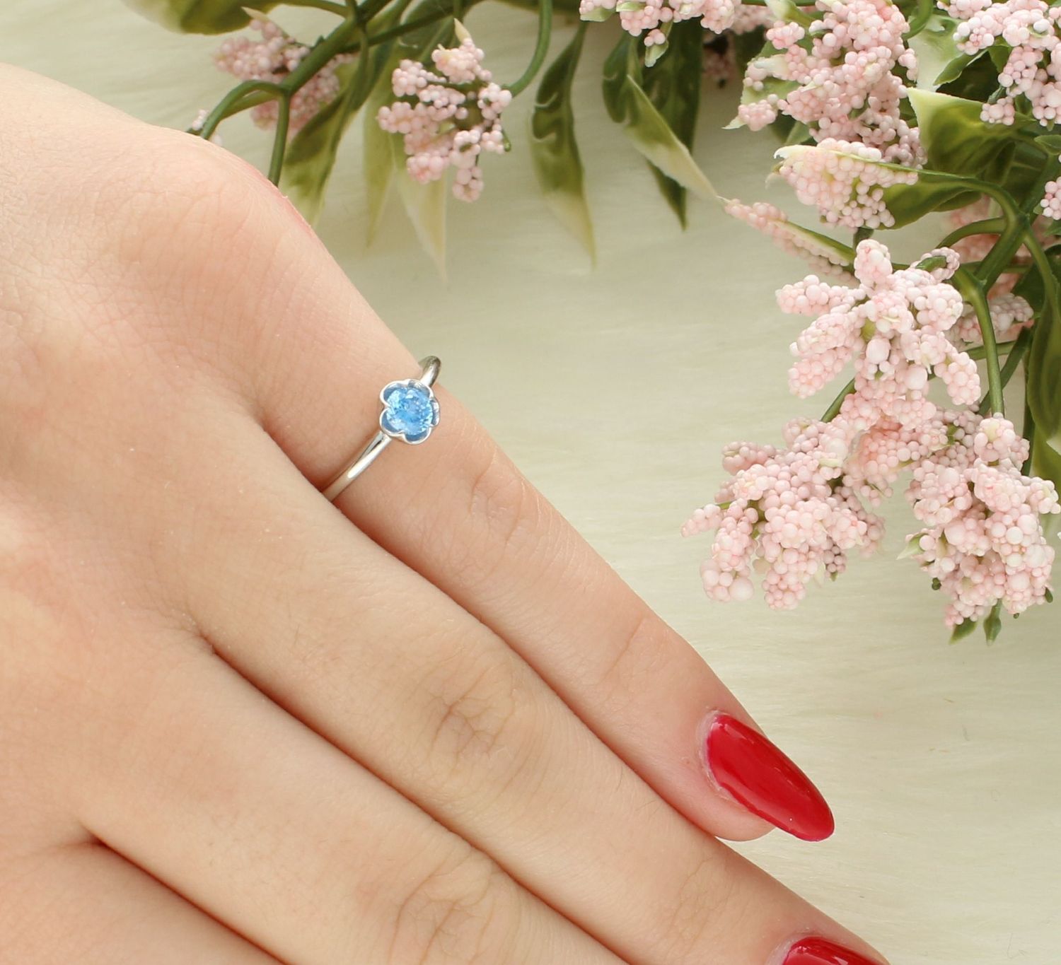 Pierścionek srebrny kwiatek niebieska cyrkonia prób 925, JMAD0051AR.jpg