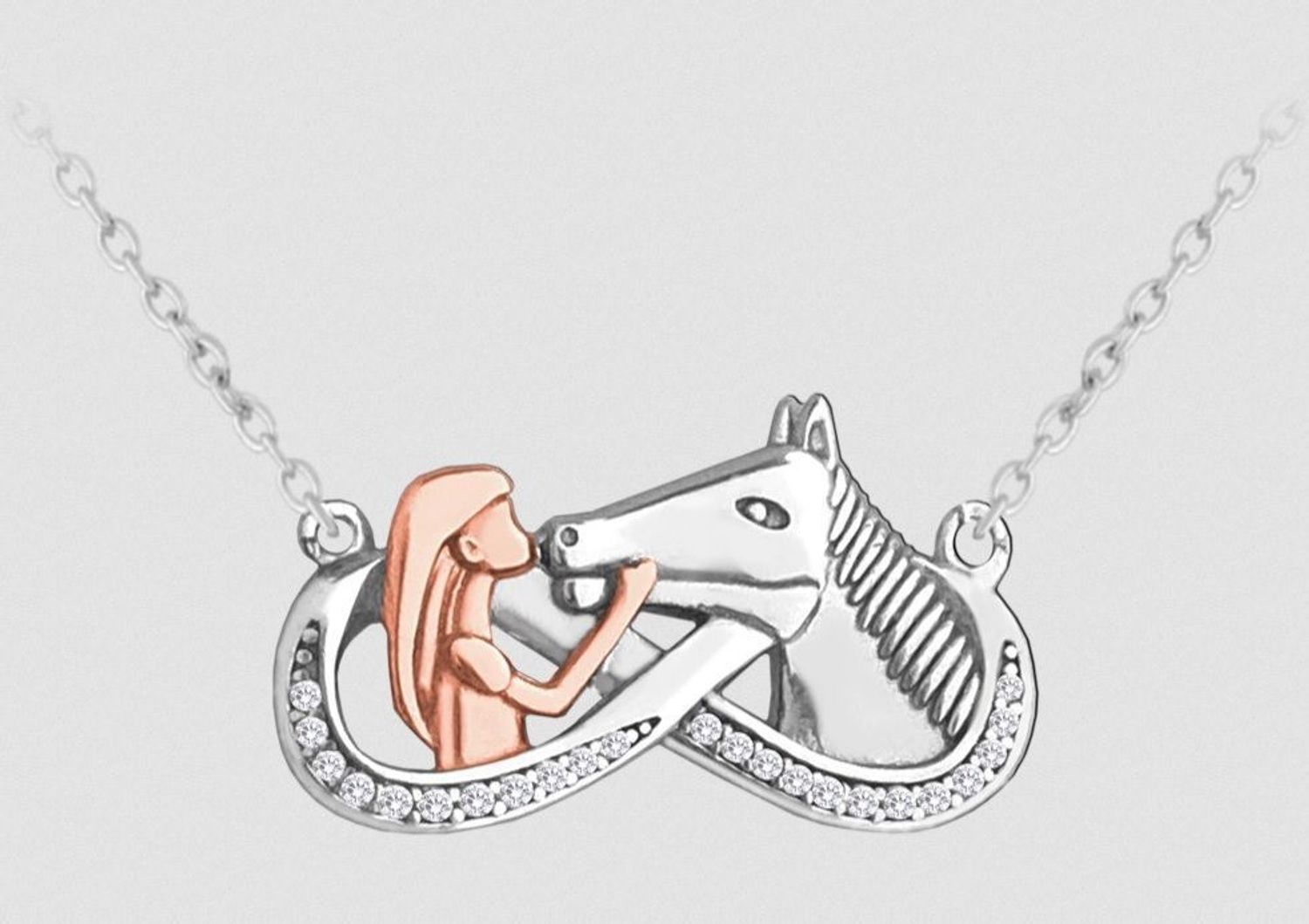 Srebrny naszyjnik z zawieszką nieskończoności 'Miłość do konia'. Srebrny naszyjnik z zawieszką nieskończoności 'Miłość do konia'. Naszyjnik został wykonany z najwyższej jakości srebra próby 925. Urocza zawieszka w kształcie pięknej zawieszki.jpg