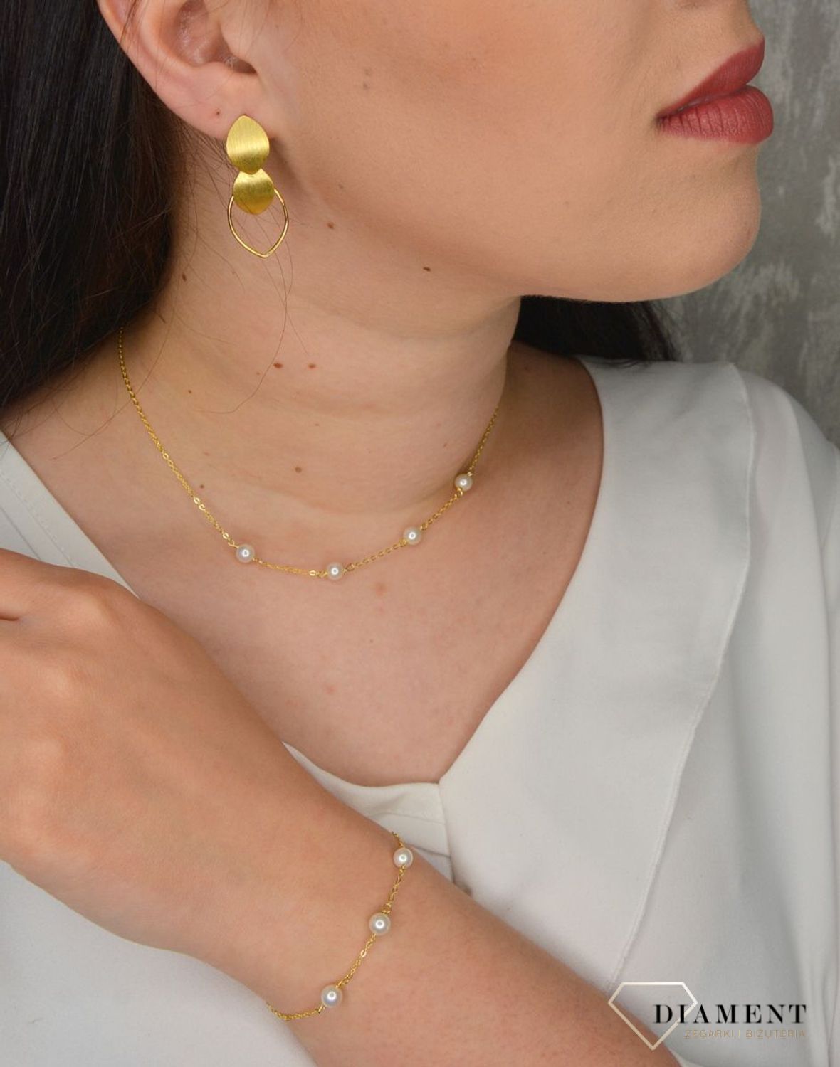 Srebrne kolczyki pozłacane owalne matowe JMAS0093XE00.jpg