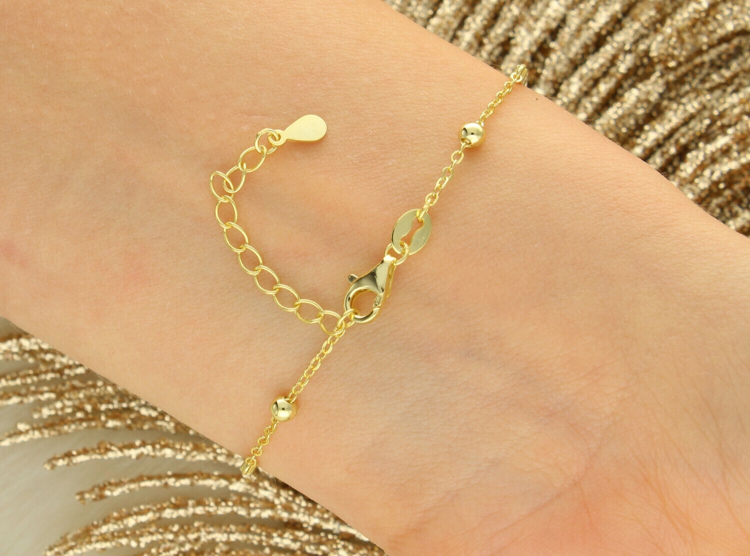 Pozłacana bransoletka damska MINET ze srebra próby 925, ozdobiona prętami i kulkami. Trwałe złocenie 14K z e-coating, elegancki styl na każdą okazję.1.jpg